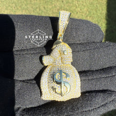 Gripping Moneybag Gold Tone CZ Pendant
