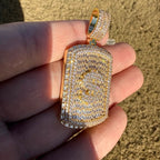 Iced Out Gold Tone Dollar Sign Dog Tag Pendant